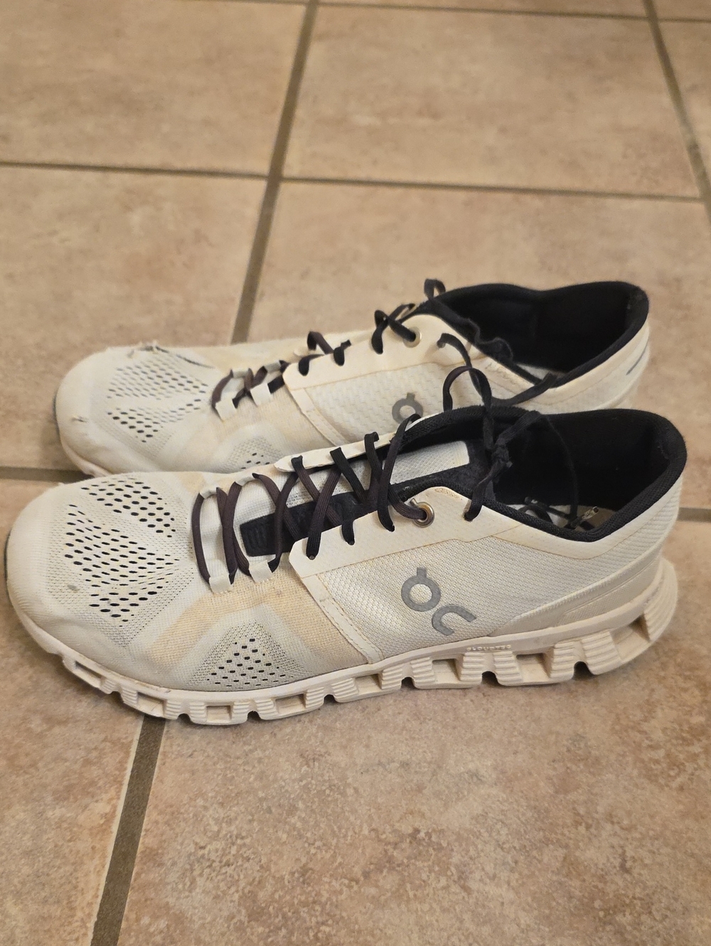 On Running Men's Athletic Shoes in Off-White with Black Accents